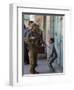 Israeli Soldier Tells a Palestinian Boy to Leave the Scene Following a Knife Attack-null-Framed Photographic Print