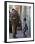 Israeli Soldier Tells a Palestinian Boy to Leave the Scene Following a Knife Attack-null-Framed Photographic Print