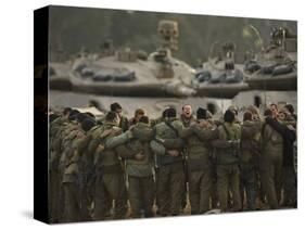 Israeli Soldiers Chant Slogans after a Briefing before Entering Gaza on a Combat Mission-null-Stretched Canvas