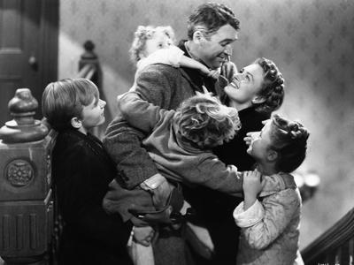 https://imgc.allpostersimages.com/img/posters/it-s-a-wonderful-life-hugged-by-family_u-L-Q1190RH0.jpg?artPerspective=n