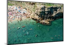 Italia, Apulia, Polignano a Mare. Crowded beach on a weekend. green.-Michele Molinari-Mounted Photographic Print
