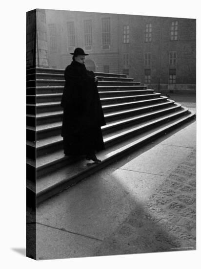 Italian Catholic Priest Majestically Descending Stairs-Alfred Eisenstaedt-Stretched Canvas