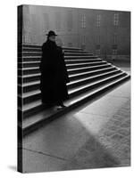 Italian Catholic Priest Majestically Descending Stairs-Alfred Eisenstaedt-Stretched Canvas