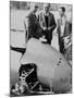 Italian Enzo Ferrari (Left), Looks over a 1959 Racing Car with Technicians-null-Mounted Photo