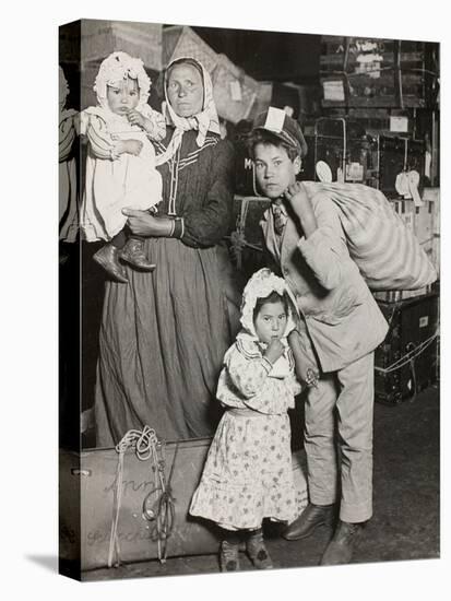 Italian Family Seeking Lost Baggage, Ellis Island, 1905-Lewis Wickes Hine-Stretched Canvas