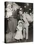 Italian Family Seeking Lost Baggage, Ellis Island, 1905-Lewis Wickes Hine-Stretched Canvas