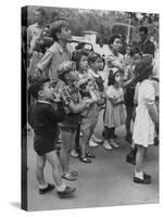 Italian Kids Watching Outdoor Puppet Show-Dmitri Kessel-Stretched Canvas