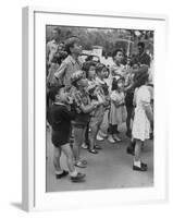 Italian Kids Watching Outdoor Puppet Show-Dmitri Kessel-Framed Photographic Print