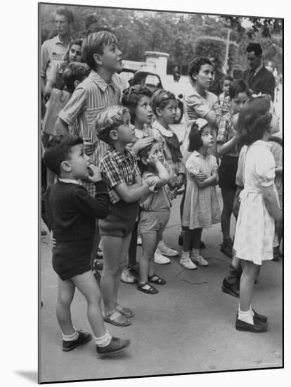 Italian Kids Watching Outdoor Puppet Show-Dmitri Kessel-Mounted Photographic Print