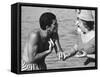 Italian Man Talking to a Woman While Enjoying a Day at the Beach-Paul Schutzer-Framed Stretched Canvas