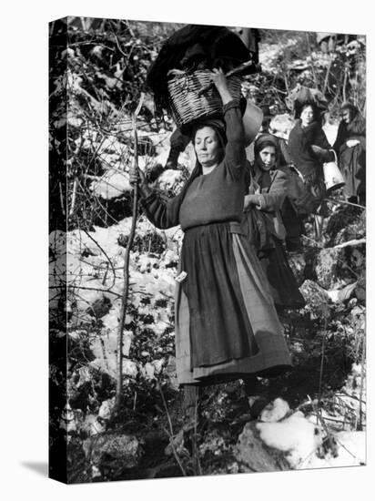 Italian Refugee Women Carrying Their Belongings in Baskets, While Fleeing Their Homes in WWII-Robert Capa-Stretched Canvas
