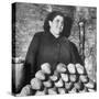 Italian Woman Selling Bread in Her Black Market Street Stall on the Tor Di Nono-Margaret Bourke-White-Stretched Canvas