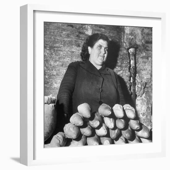 Italian Woman Selling Bread in Her Black Market Street Stall on the Tor Di Nono-Margaret Bourke-White-Framed Photographic Print