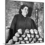 Italian Woman Selling Bread in Her Black Market Street Stall on the Tor Di Nono-Margaret Bourke-White-Mounted Photographic Print