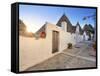 Italy, Apulia, Bari District, Itria Valley, Alberobello, Trulli (Typical Houses)-Francesco Iacobelli-Framed Stretched Canvas