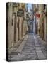 Italy, Apulia, Foggia, Vieste. A picturesque alley in Vieste old town.-Julie Eggers-Stretched Canvas