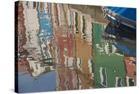 Italy, Burano, reflection of colorful houses in canal.-Merrill Images-Stretched Canvas