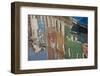 Italy, Burano, reflection of colorful houses in canal.-Merrill Images-Framed Premium Photographic Print