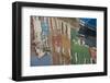 Italy, Burano, reflection of colorful houses in canal.-Merrill Images-Framed Photographic Print