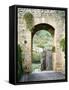 Italy, Chianti, Monteriggioni. Looking out an arched entrance into the walled town.-Julie Eggers-Framed Stretched Canvas