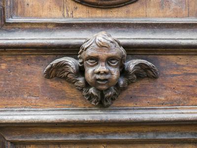 https://imgc.allpostersimages.com/img/posters/italy-florence-carved-ornament-on-a-door-in-florence_u-L-Q1IKCQ90.jpg?artPerspective=n