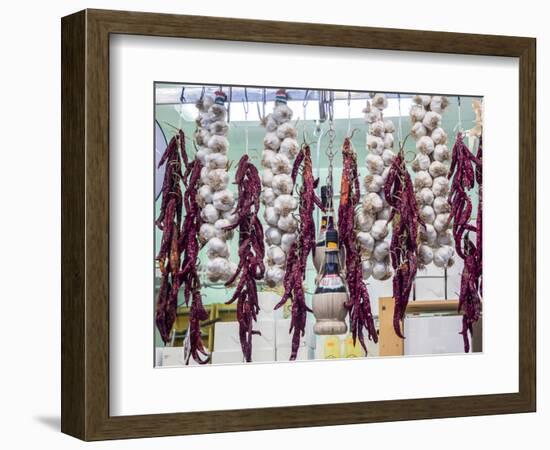 Italy, Florence. Garlic and peppers for sale hanging in a shop in the Central Market-Julie Eggers-Framed Photographic Print