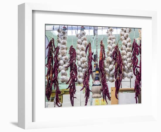 Italy, Florence. Garlic and peppers for sale hanging in a shop in the Central Market-Julie Eggers-Framed Photographic Print