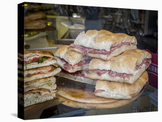 Italy, Florence. Ready made sandwiches for sale in the Central Market, Mercato Centrale in Florence-Julie Eggers-Stretched Canvas
