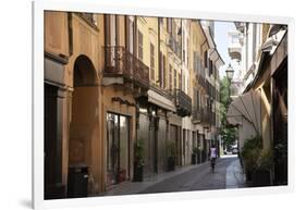 Italy, Lombardy, Cremona, cobblestone street with bicycles and old buildings-Alan Klehr-Framed Photographic Print