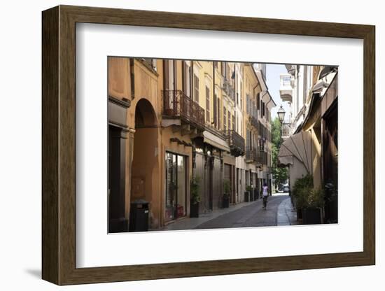 Italy, Lombardy, Cremona, cobblestone street with bicycles and old buildings-Alan Klehr-Framed Photographic Print