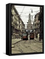 Italy, Lombardy, Milan, Milan Trams on Via Orefici with Castello Sforzesco, Dawn-Walter Bibikow-Framed Stretched Canvas