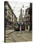 Italy, Lombardy, Milan, Milan Trams on Via Orefici with Castello Sforzesco, Dawn-Walter Bibikow-Stretched Canvas