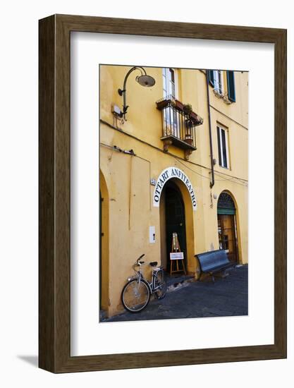 Italy, Lucca, Street Scene with bicycles ready to go.-Terry Eggers-Framed Photographic Print