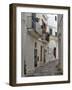 Italy, Puglia, Brindisi, Itria Valley, Ostuni. The narrow alleyways of the old town of Ostuni.-Julie Eggers-Framed Photographic Print