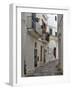 Italy, Puglia, Brindisi, Itria Valley, Ostuni. The narrow alleyways of the old town of Ostuni.-Julie Eggers-Framed Photographic Print