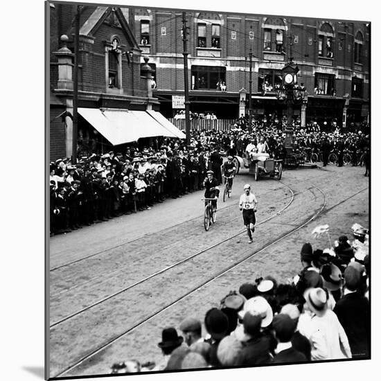 Italy's Dorando Pietri in Action During the Marathon Race at the 1908 Olympic Games-null-Mounted Premium Photographic Print