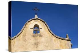 Italy, Sardinia, Gavoi. the Bell and Cross of an Old Church, Backed by a Blue Sky-Alida Latham-Stretched Canvas