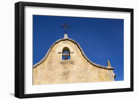 Italy, Sardinia, Gavoi. the Bell and Cross of an Old Church, Backed by a Blue Sky-Alida Latham-Framed Photographic Print