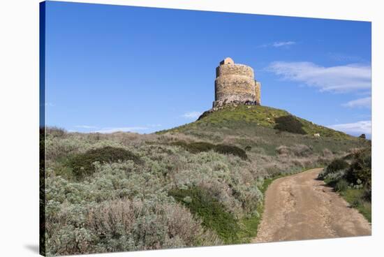 Italy, Sardinia, Oristano. Dirt Road Leading around the Torre Spangla Di San Giovanni Di Sinis-Alida Latham-Stretched Canvas