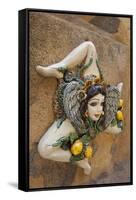 Italy, Sicily, Taormina, ceramic woman with lemons on wall.-Merrill Images-Framed Stretched Canvas