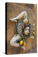 Italy, Sicily, Taormina, ceramic woman with lemons on wall.-Merrill Images-Stretched Canvas