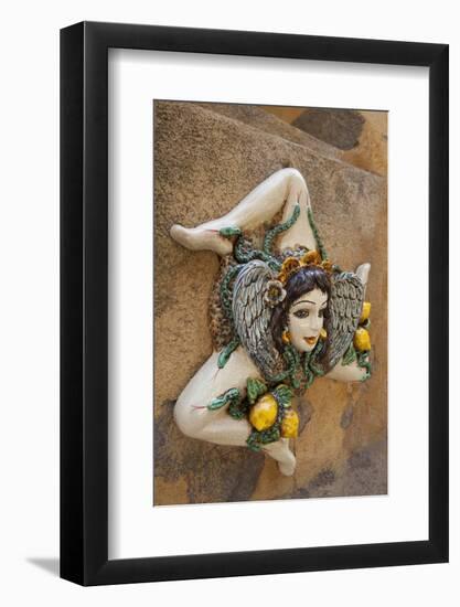 Italy, Sicily, Taormina, ceramic woman with lemons on wall.-Merrill Images-Framed Photographic Print