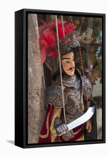 Italy, Sicily, Taormina, knight marionette puppet.-Merrill Images-Framed Stretched Canvas