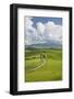 Italy, Tuscany. a Country Road Meanders Through Rolling Hills of Wheat Below Pienza-Brenda Tharp-Framed Photographic Print