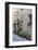 Italy, Tuscany, Crete Senesi, Asciano. Street scene with potted flowers-Julie Eggers-Framed Photographic Print