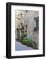 Italy, Tuscany, Crete Senesi, Asciano. Street scene with potted flowers-Julie Eggers-Framed Photographic Print