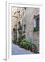 Italy, Tuscany, Crete Senesi, Asciano. Street scene with potted flowers-Julie Eggers-Framed Photographic Print