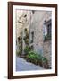Italy, Tuscany, Crete Senesi, Asciano. Street scene with potted flowers-Julie Eggers-Framed Photographic Print