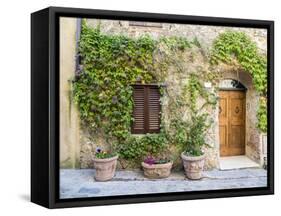 Italy, Tuscany. Entrance to a home in Tuscany decorated with potted plants.-Julie Eggers-Framed Stretched Canvas