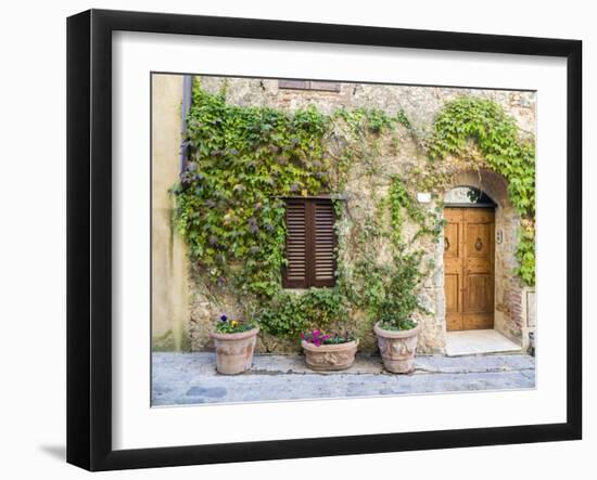 Italy, Tuscany. Entrance to a home in Tuscany decorated with potted plants.-Julie Eggers-Framed Photographic Print